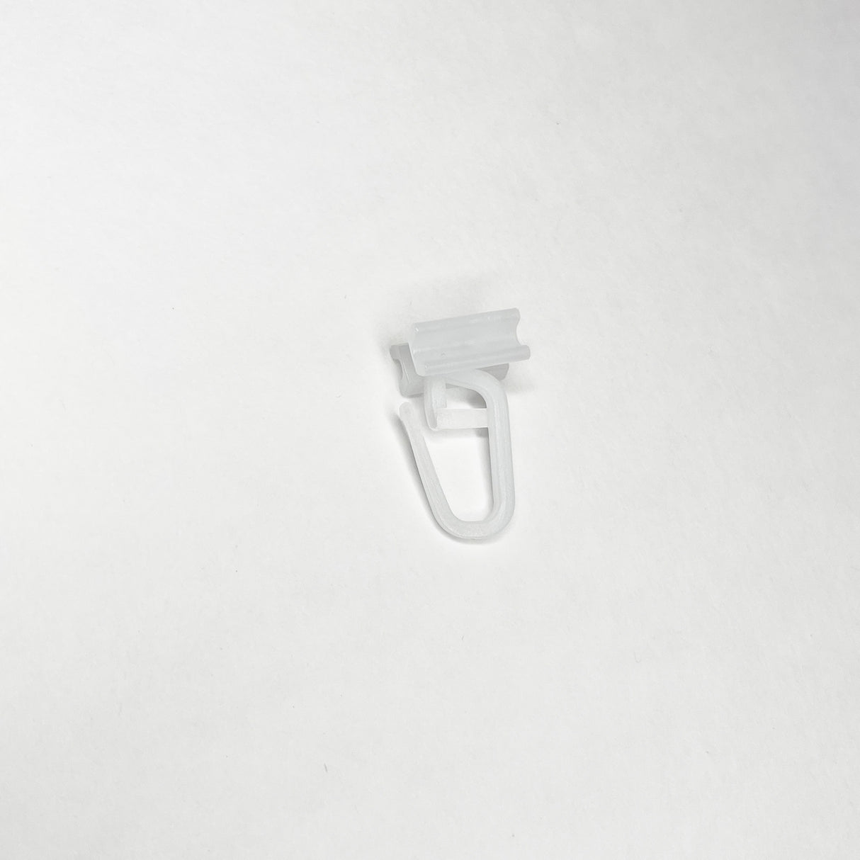 Gancetti per tende in plastica bianca, confezione da 10 pezzi acquistare Gancetti per tende in plastica bianca, confezione da 10 pezzi — Foto